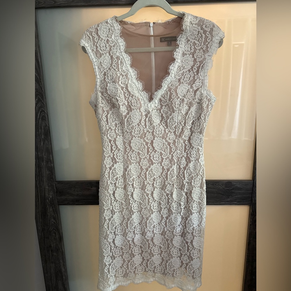 INC, NWT, sleeveless, white dress with crème colored lining, size 14.